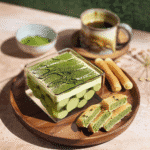 Matcha Tiramisu 13 Slice of matcha tiramisu served with ladyfingers and matcha tea
