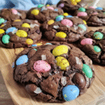Mini Eggs Chocolate Cookies Kids Will Love 11 Mini eggs chocolate cookies with colorful Cadbury candies on a plate