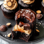 Reese’s PB Cup Cake Recipe 11 Reese’s PB Cup Cakes arranged on platter with napkin and drink pairing