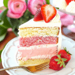 How to Make the Perfect Strawberries and Cream Cheesecake Cake 11 strawberries and cream cheesecake cake recipe decorated with piped frosting and fresh berries