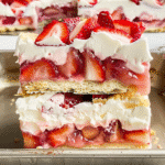 Strawberry Tiramisu Dessert That Will Surprise Everyone at the Table 9 strawberry tiramisu dessert in glass dish with layers of cream and strawberries