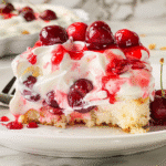 Heaven on Earth Cake Recipe That Wins Every Time 13 Close-up of Heaven on Earth Cake layers with cherry topping