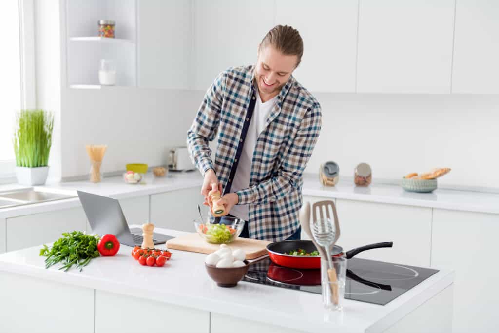 Autors 3 man is cooking modern kitchen